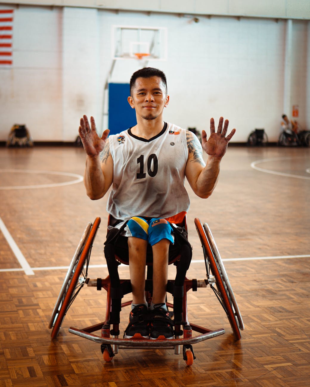portrait of basketball player on wheelchair